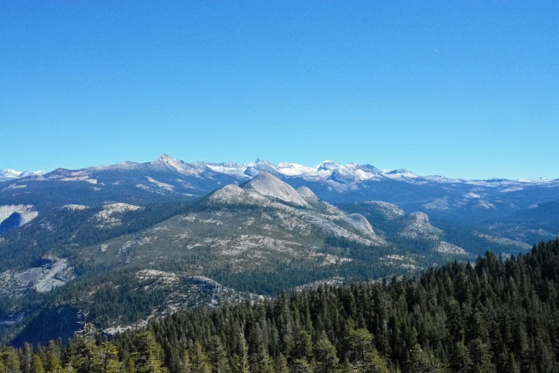 a very beautiful view of some mountains in the day