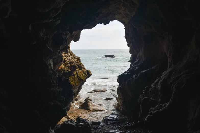 there is a rock outcropping in the water