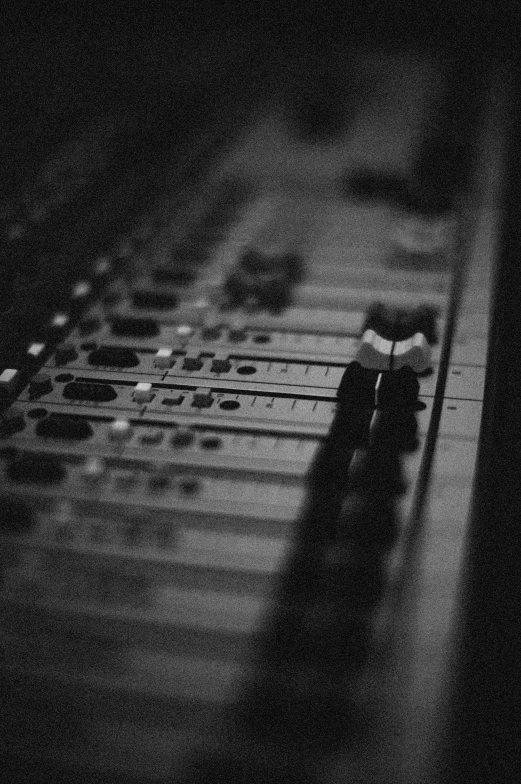 black and white pograph of a mixing board