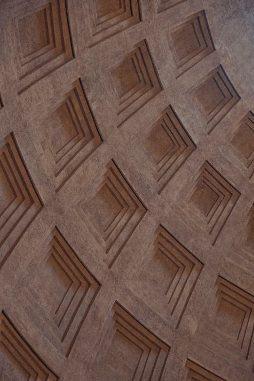 a brown tile with lots of squares and columns