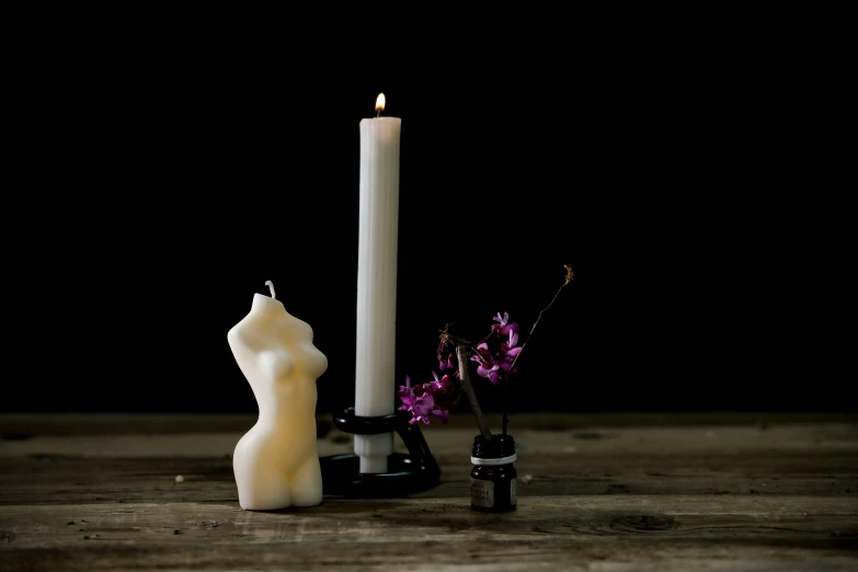 there are candles that have been set on a table