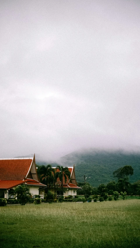 the sky is gloomy and cloudy at this house