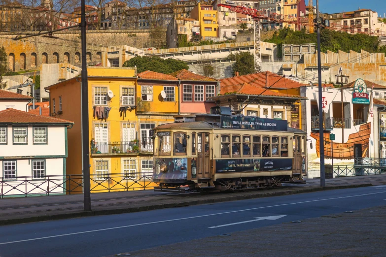 a city with buildings and a cable car