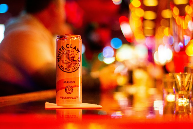 a bottle of beer sitting on top of a table