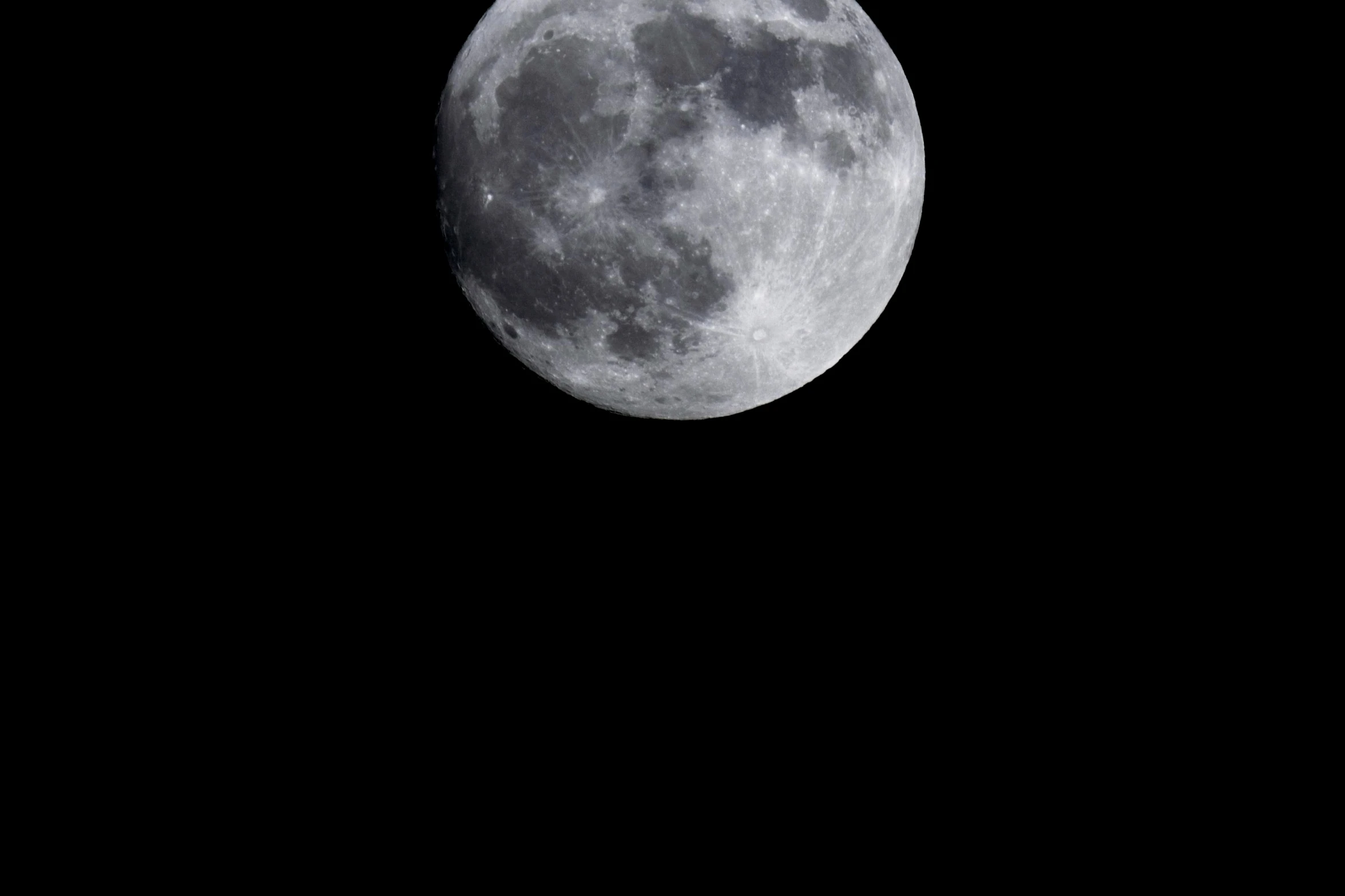 a large full moon seen in the sky