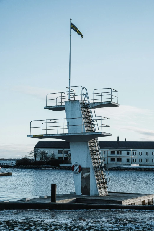 a life guard tower in front of some buildings