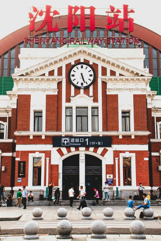 a large clock on top of a large building