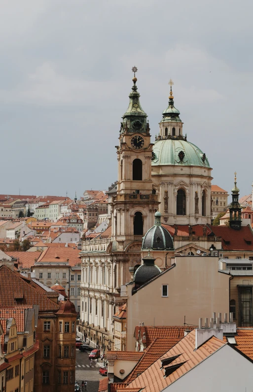 an overview of old city in europe with an old church