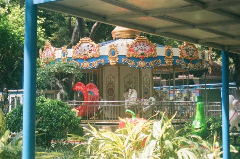 some people on a merry go round ride