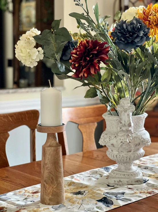 a tall vase on top of a table