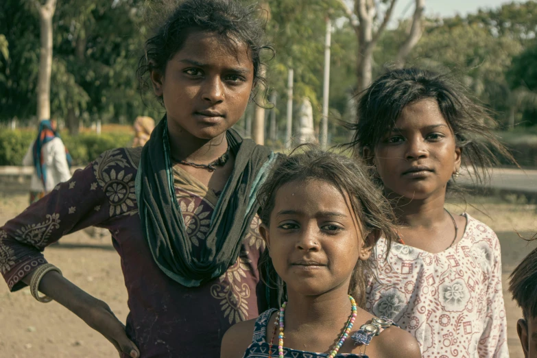 a group of people standing next to each other