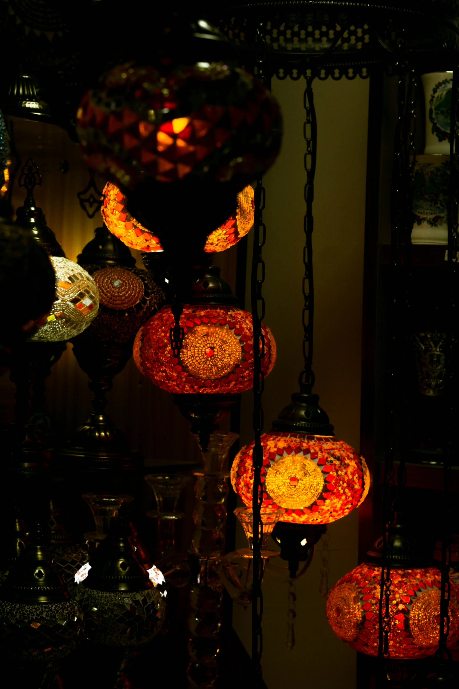 several lamps in the dark are illuminated for light