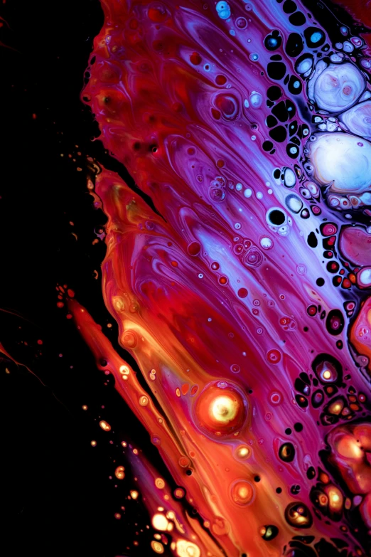 close up image of paint with bubbles and drops