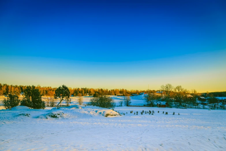 a snowy view of the countryside from above