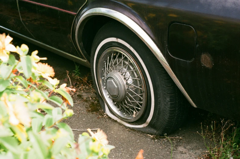 a closeup view of an old car wheel