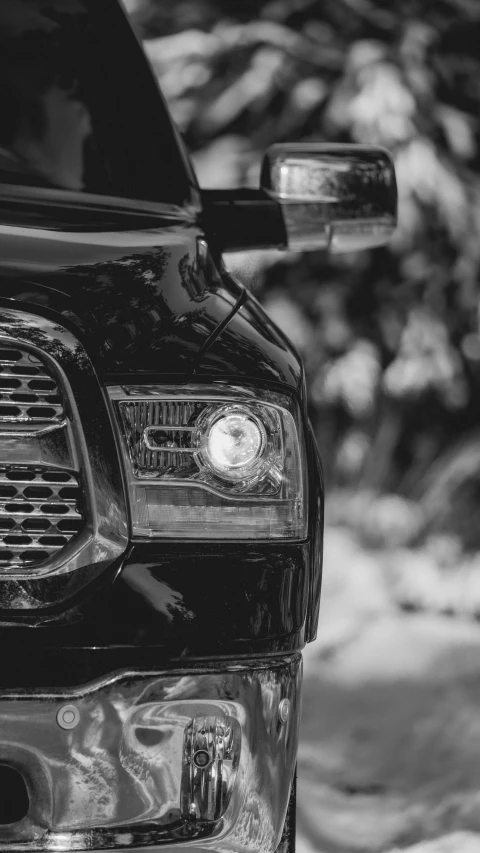 a black and white po of a ram truck's grill lights