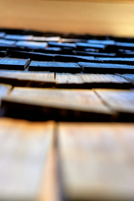 a computer keyboard that is laying on the ground