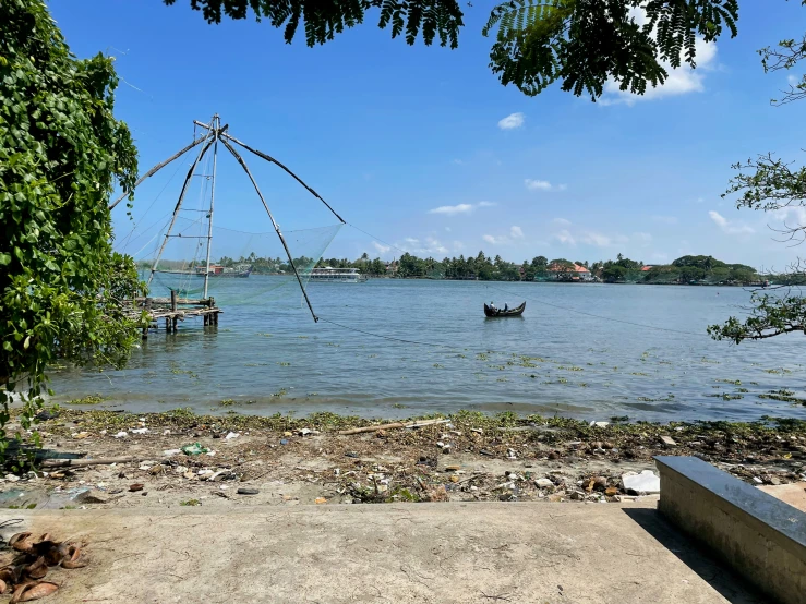 boats are docked at the waters edge on the water