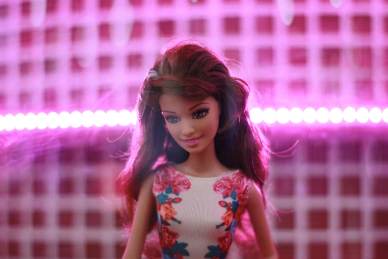 a barbie doll with red hair and blue eyes