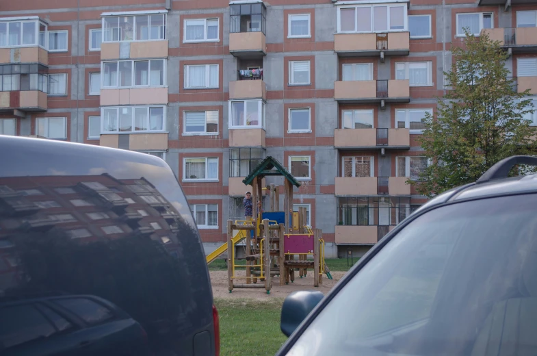 a child's play area in front of some buildings