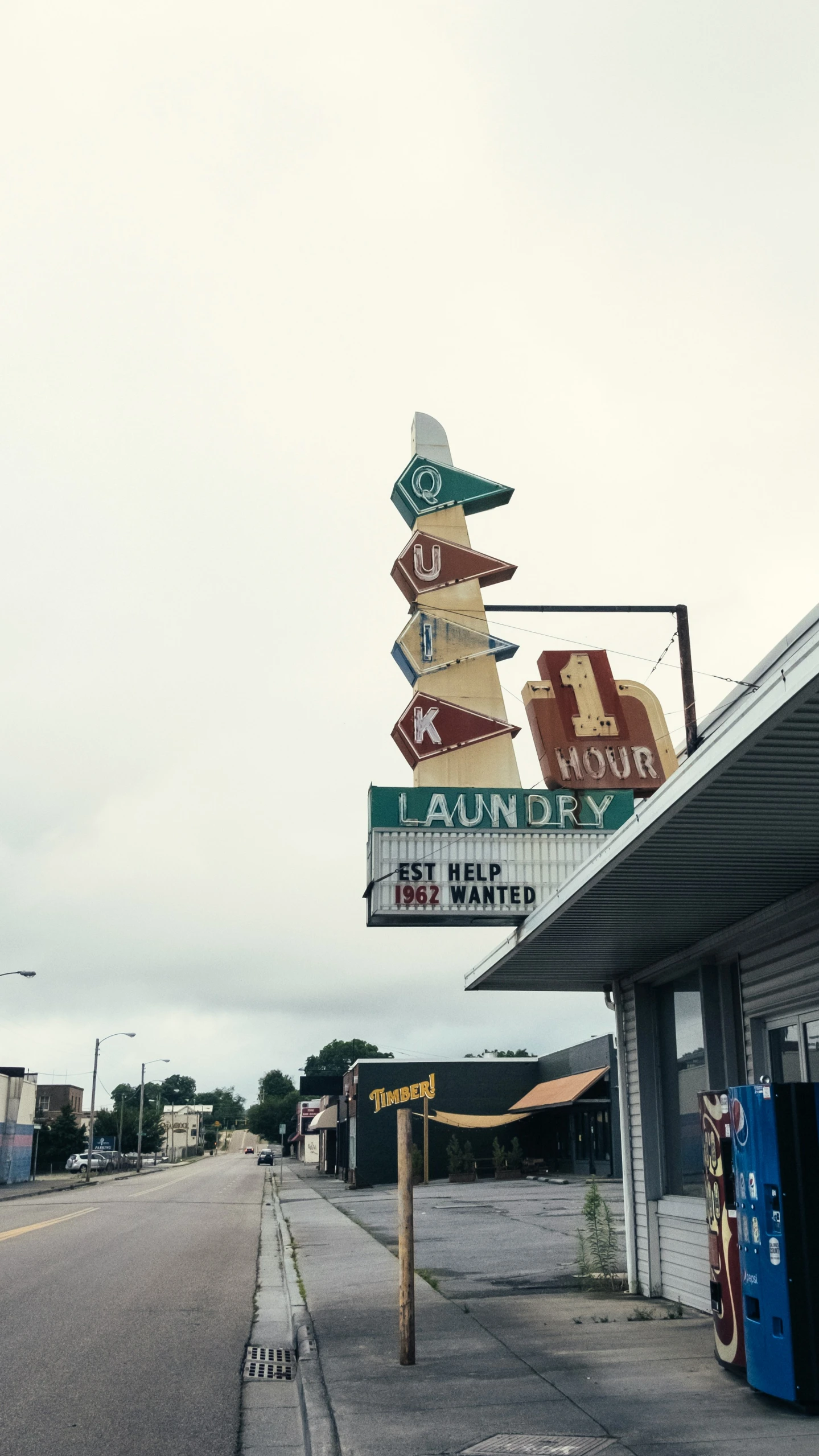 a large sign is posted on the side of a building