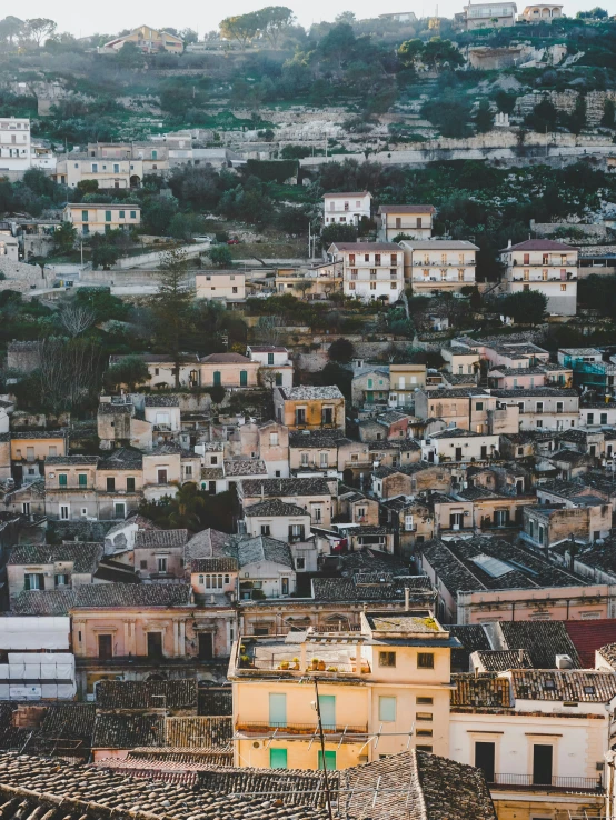 a city is shown with many buildings as far as the eye can see