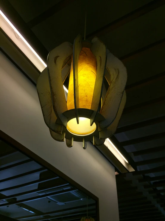 a very long light fixture hanging from the ceiling