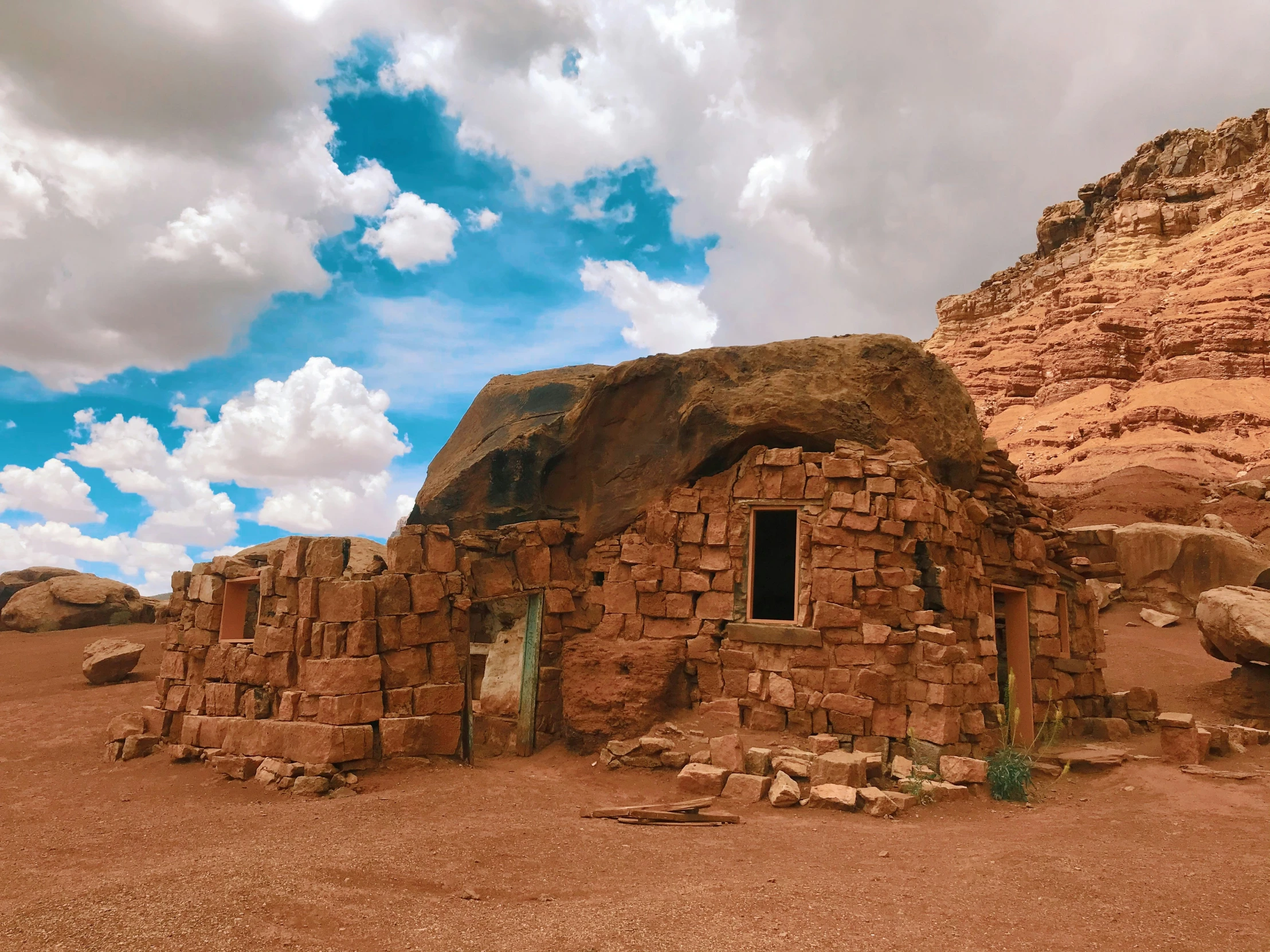 a small adobe house made out of bricks