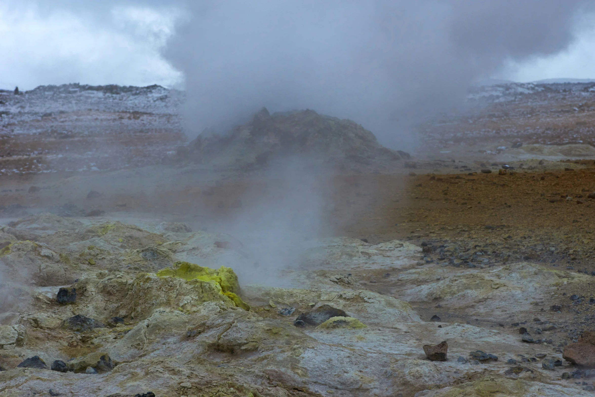 a view of an active area of lava and steam