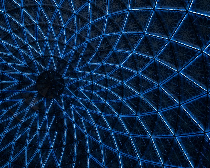 a close up of a pattern made from blue lights
