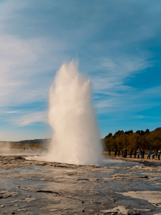 a large geyser spewing out water into the air