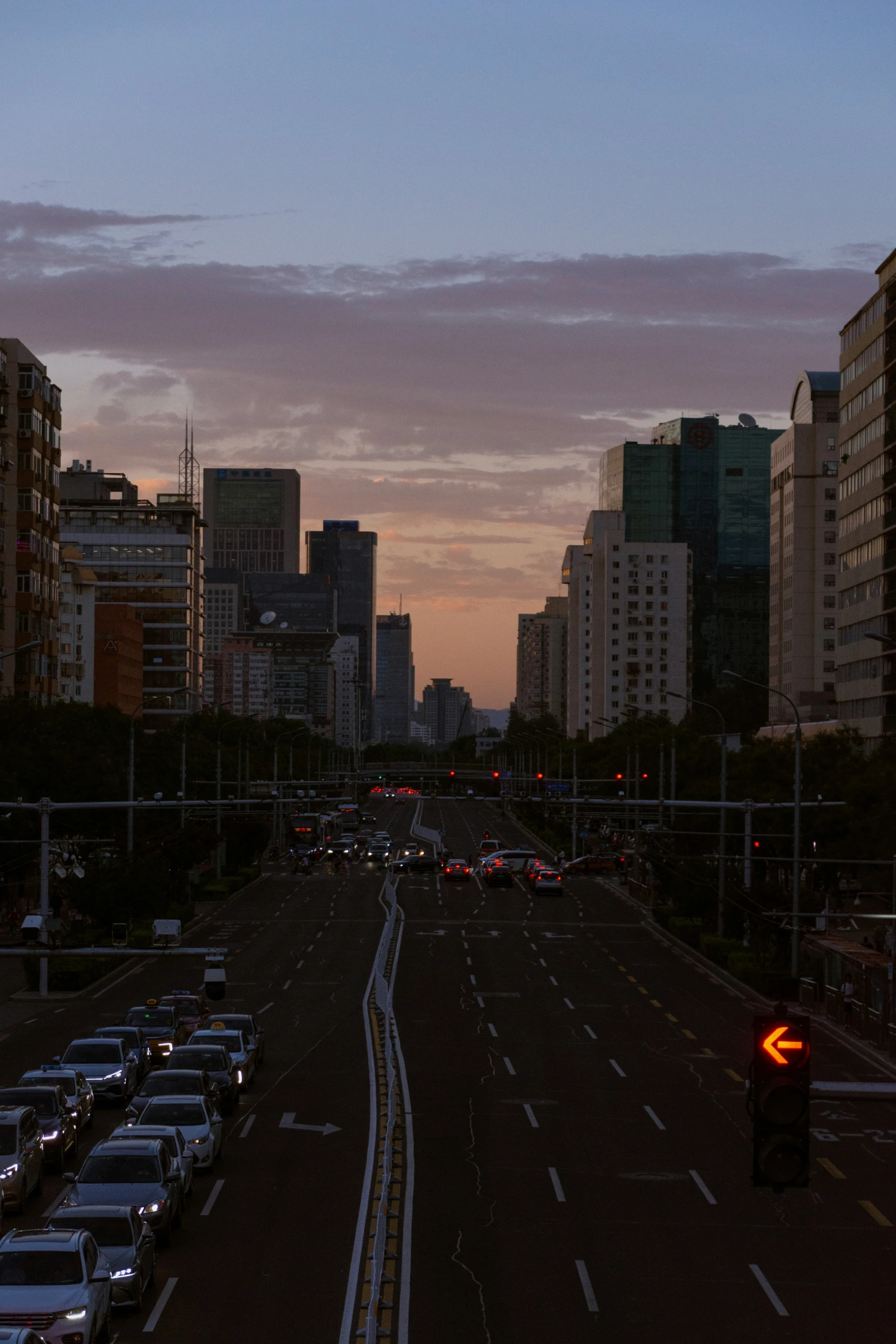 there is an intersection with cars in this city