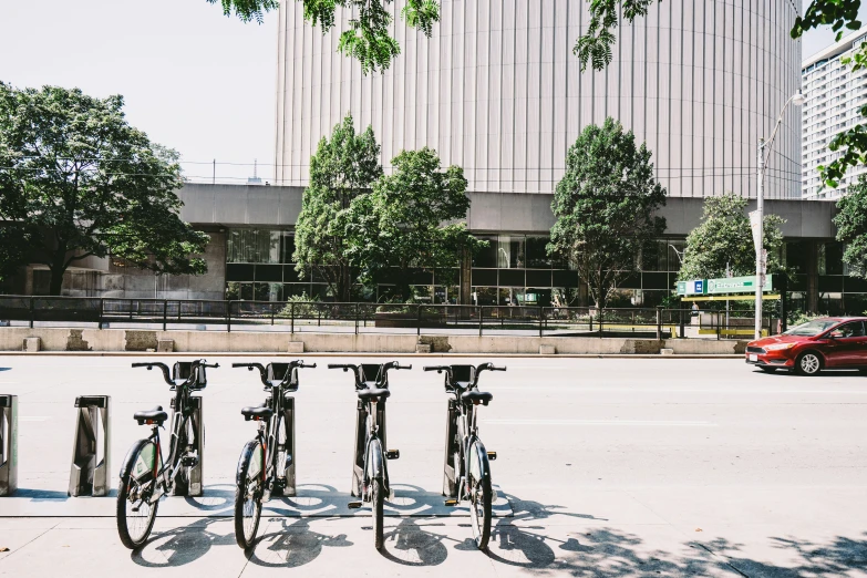 the bikes are locked up at the side of the road