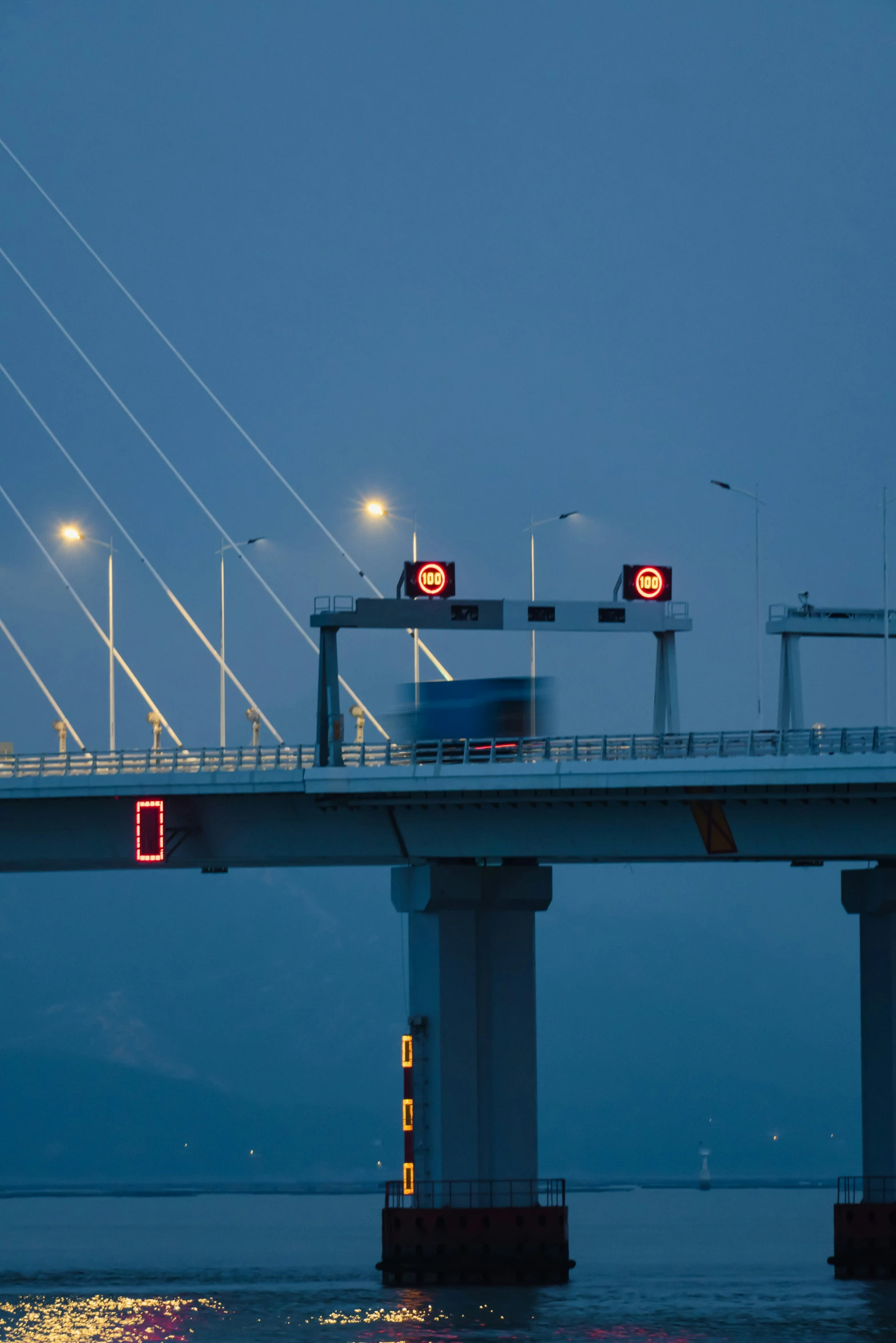 there are some red lights above the highway