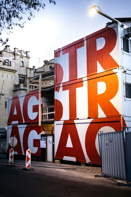 there are some buildings painted red and white