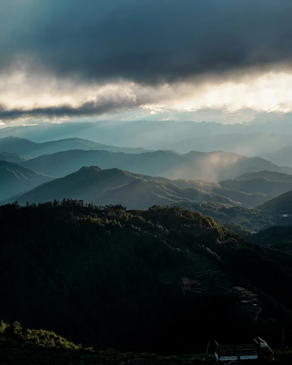 the sky and clouds in the mountains are bright