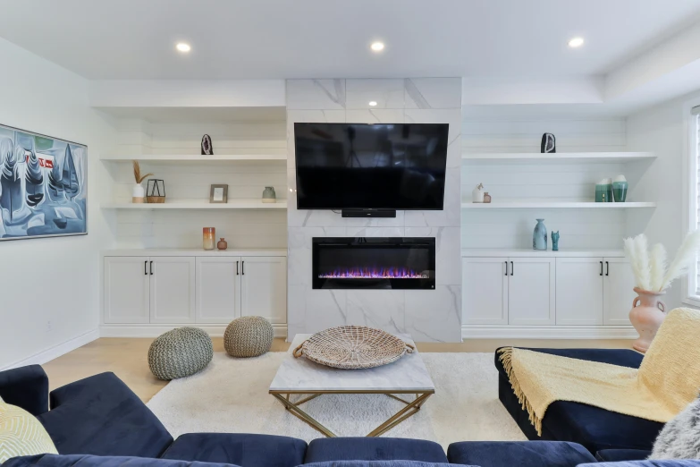 this living room has blue and white furniture