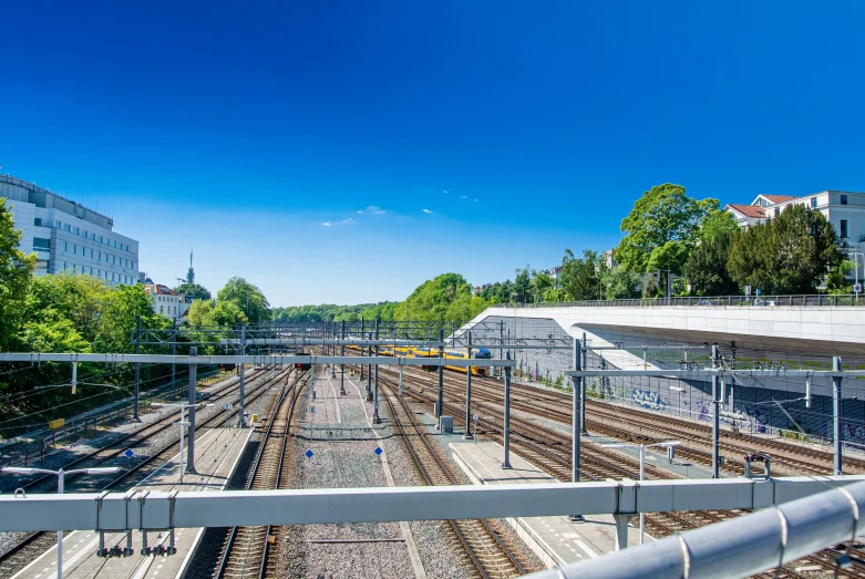 an empty train track with the tracks going parallel to one another