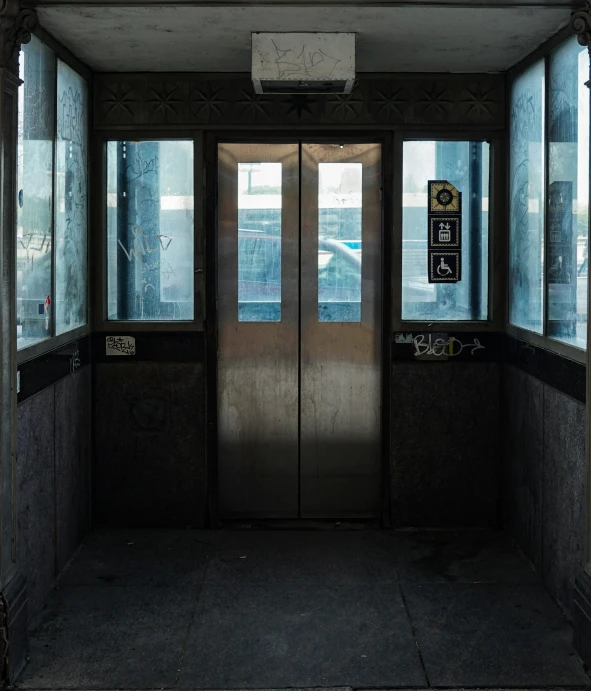 the doors and window in an empty, dark room