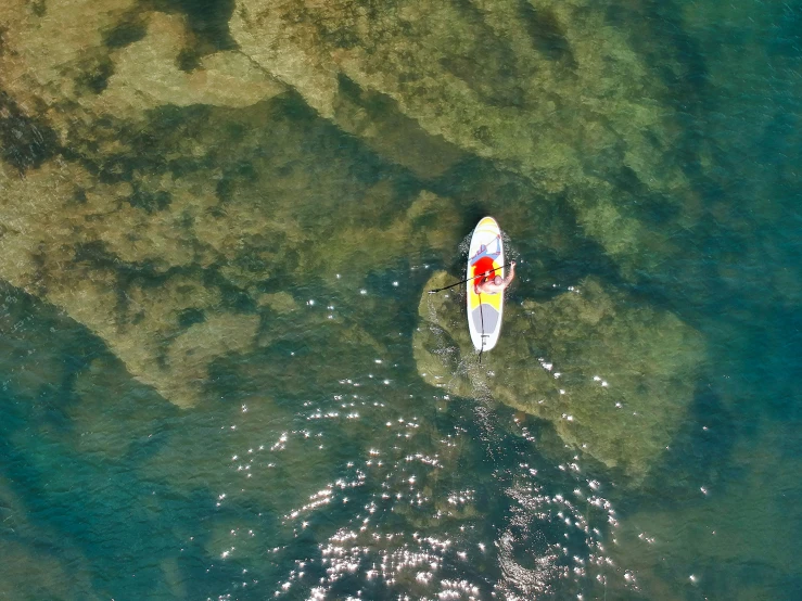 a boat that is floating on some water