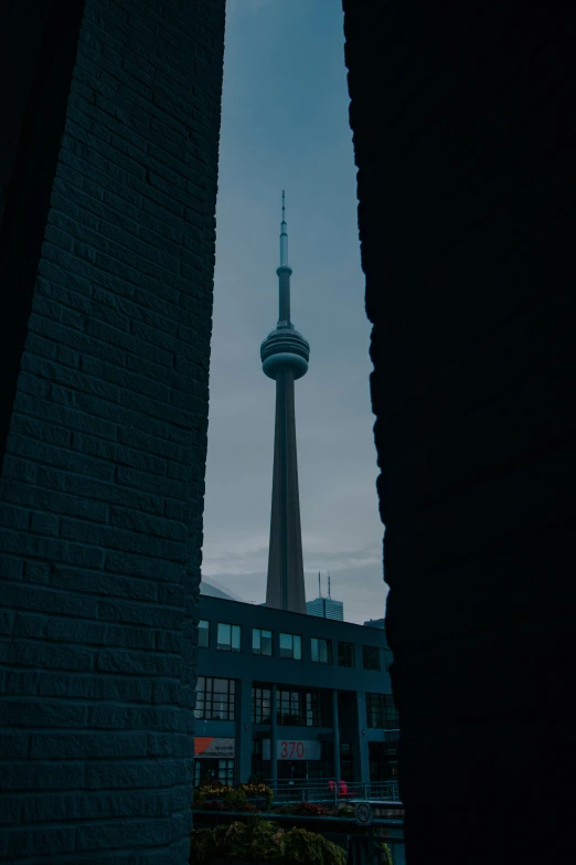 looking through a door at a tower with the top of it