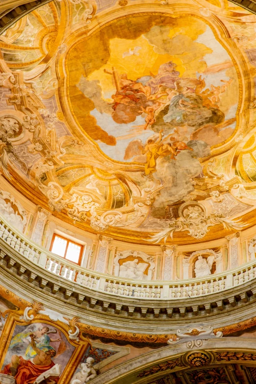 large ornate painted ceiling inside of building