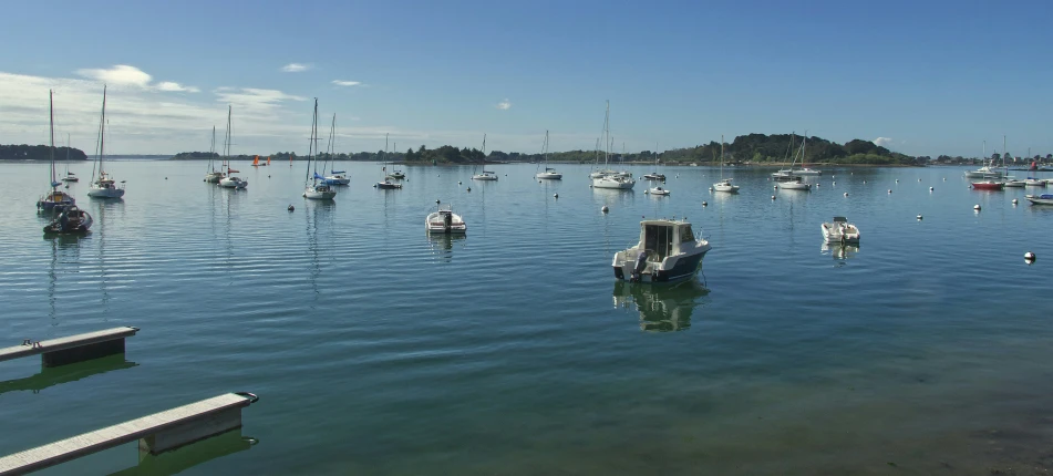 the boats are sailing on the lake, and many have a lot of water