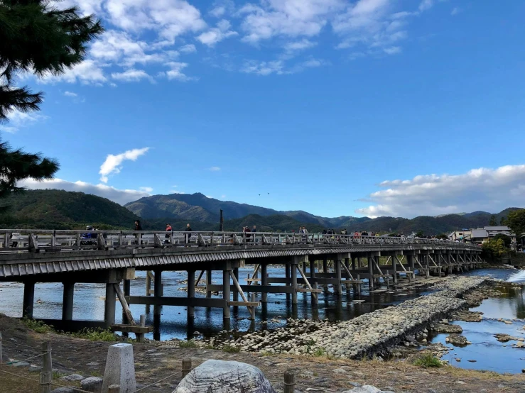 there is a wooden walkway over a body of water