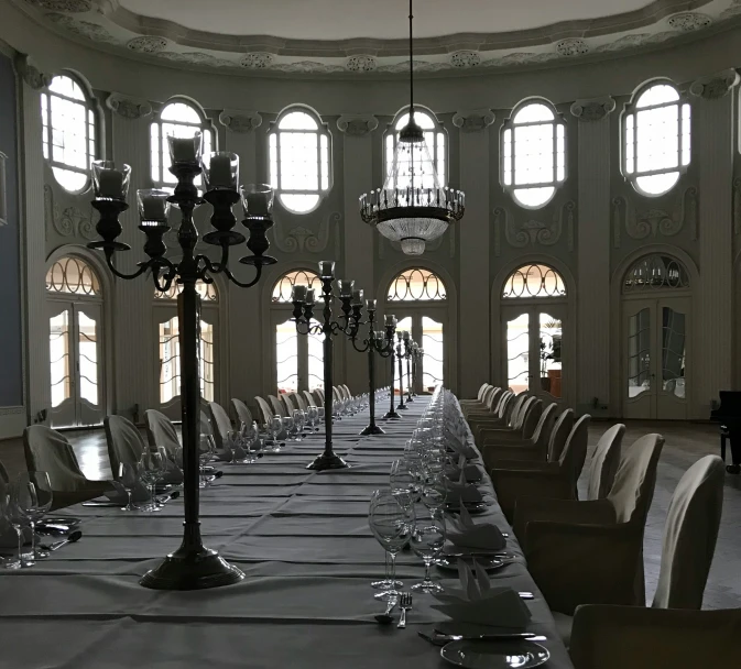 a table is set with plates and forks