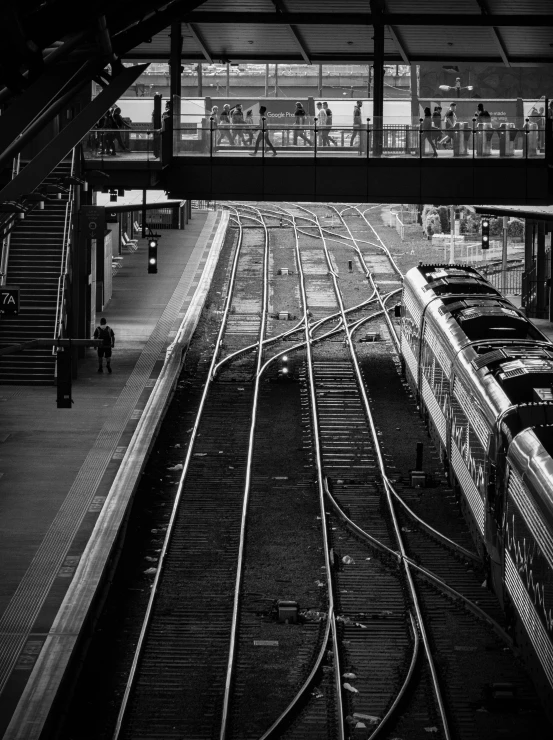 some trains are coming up the tracks and going down the track