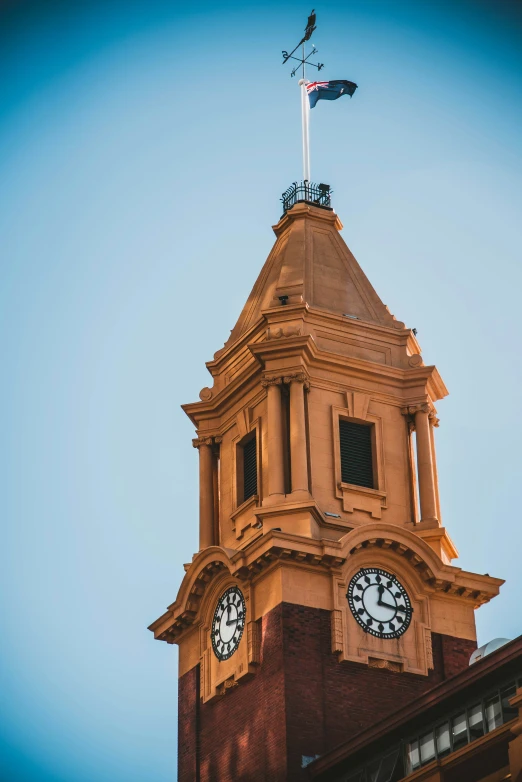 there is a clock tower that has three clocks on each side