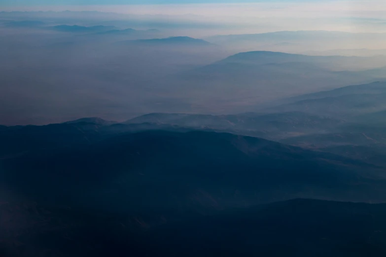 a picture of some mountains out the window