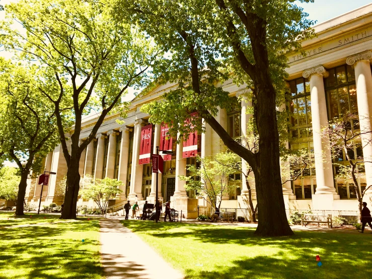 a large building is seen in the daytime sun