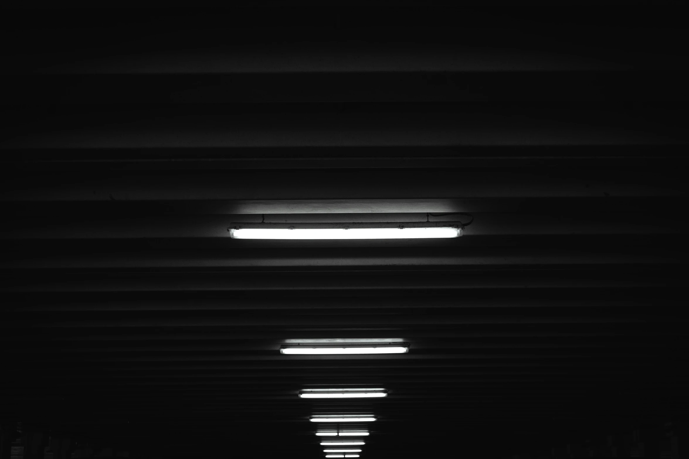 black and white pograph of the inside of an overpass